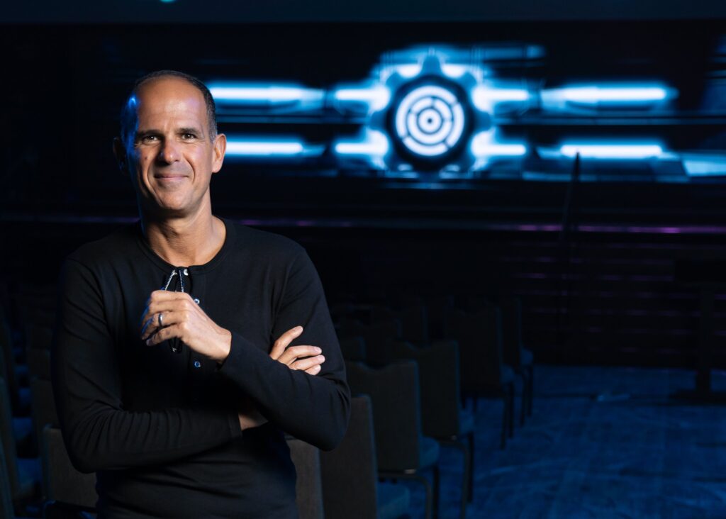 Marcus Speaking Highlight in auditorium